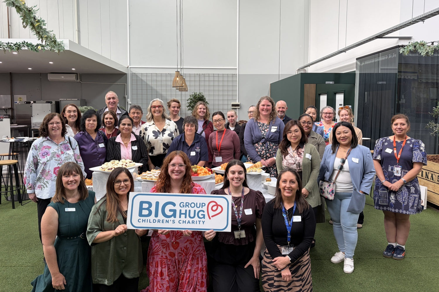 Aiwibi Celebrates Partnership with Big Group Hug at International Women's Day Event