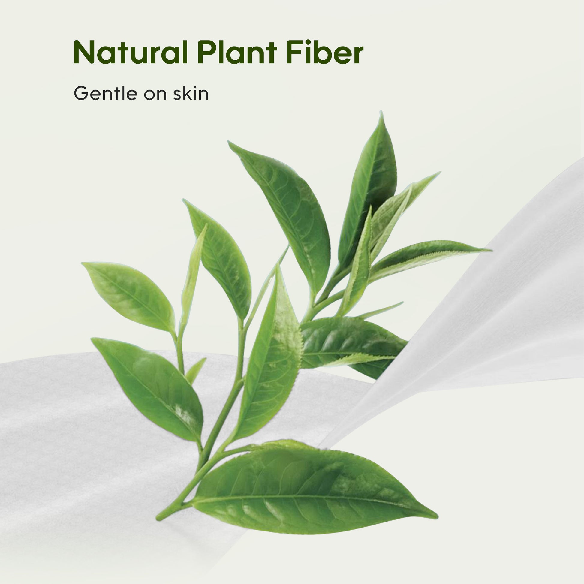 Close-up of soft Aiwibi Green Tea Mini Wipes, emphasizing the refreshing green tea fragrance.